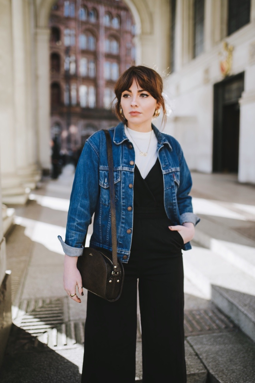 jean jacket with black jumpsuit